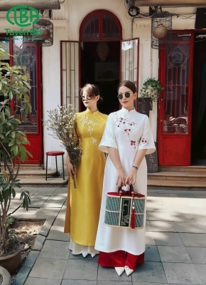 Áo dài Trắng thêu cành hoa 