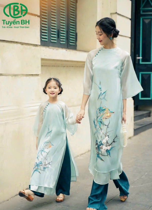 Áo dài cho bé màu Xanh thêu chim họa mi 