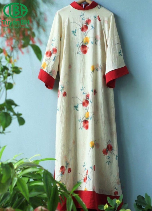 Áo dài in cành lựu màu Kem viền Đỏ
