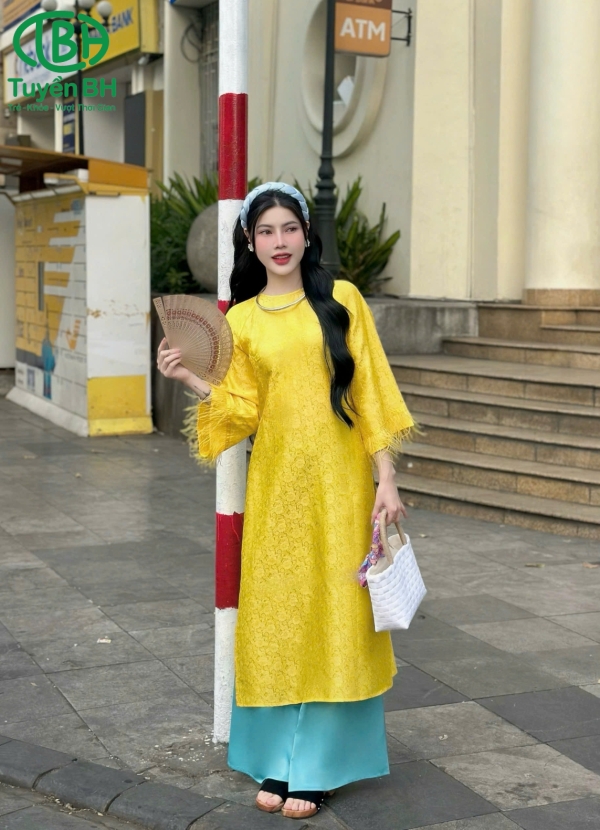Áo dài tơ tằm tay lông đà điểu Tím
