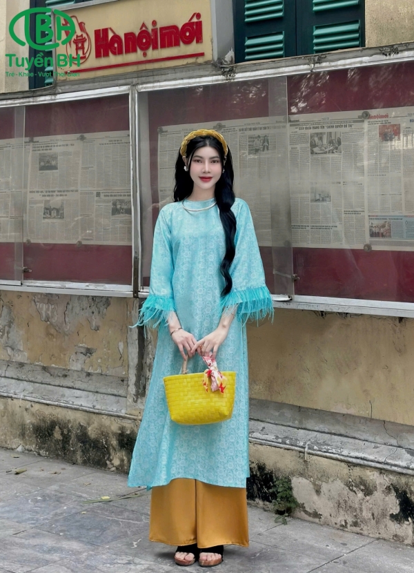 Áo dài tơ tằm tay lông đà điểu Tím
