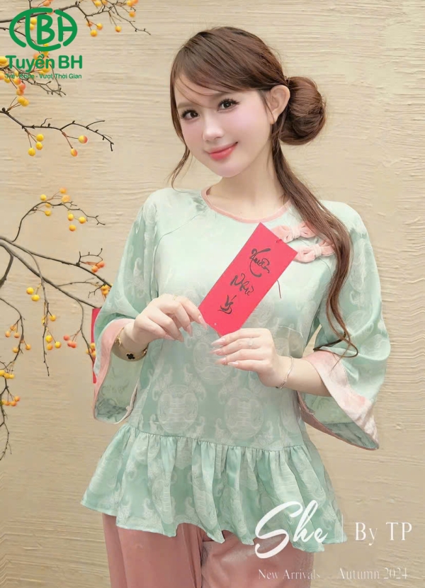 Bộ lụa mẹ và bé có đính nơ của mẹ màu hồng