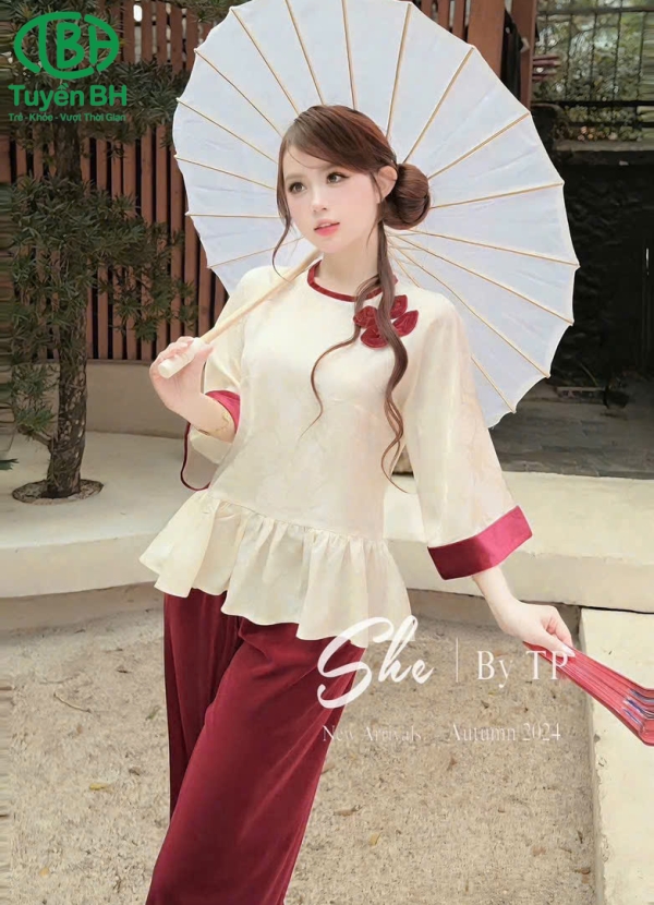 Bộ lụa mẹ và bé có đính nơ của mẹ màu xanh ngọc