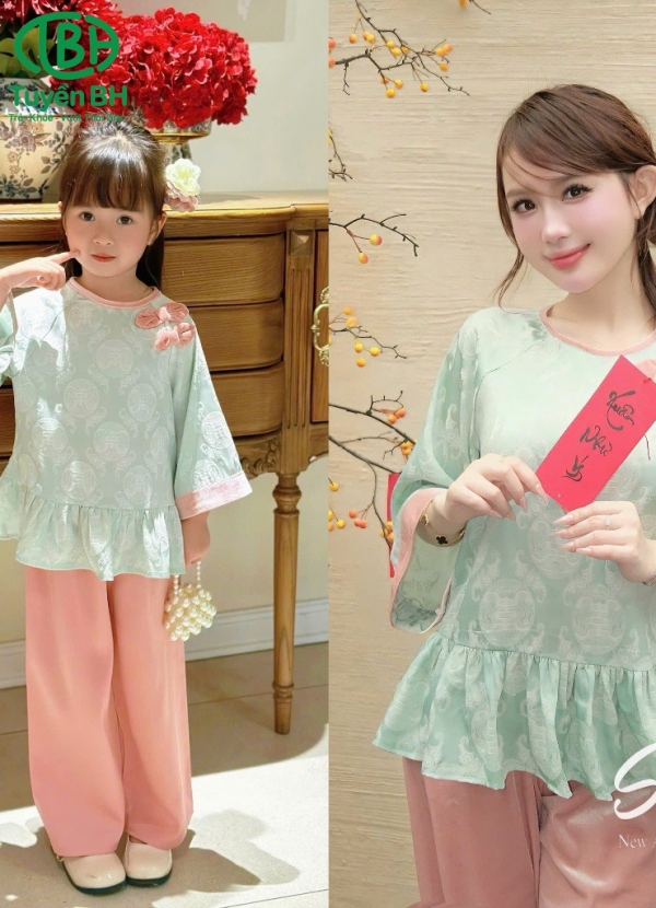 Bộ lụa mẹ và bé có đính nơ của bé màu hồng